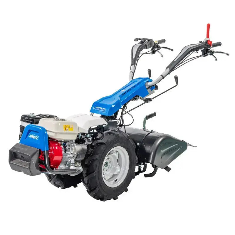 Motoculteur STAUB JOGGER 7HL avec fraises arrière 60 cm et kit labour complet. Moteur thermique Honda GX 200, guidon réglable, prise de force, transmission pro et système Quick Fit.